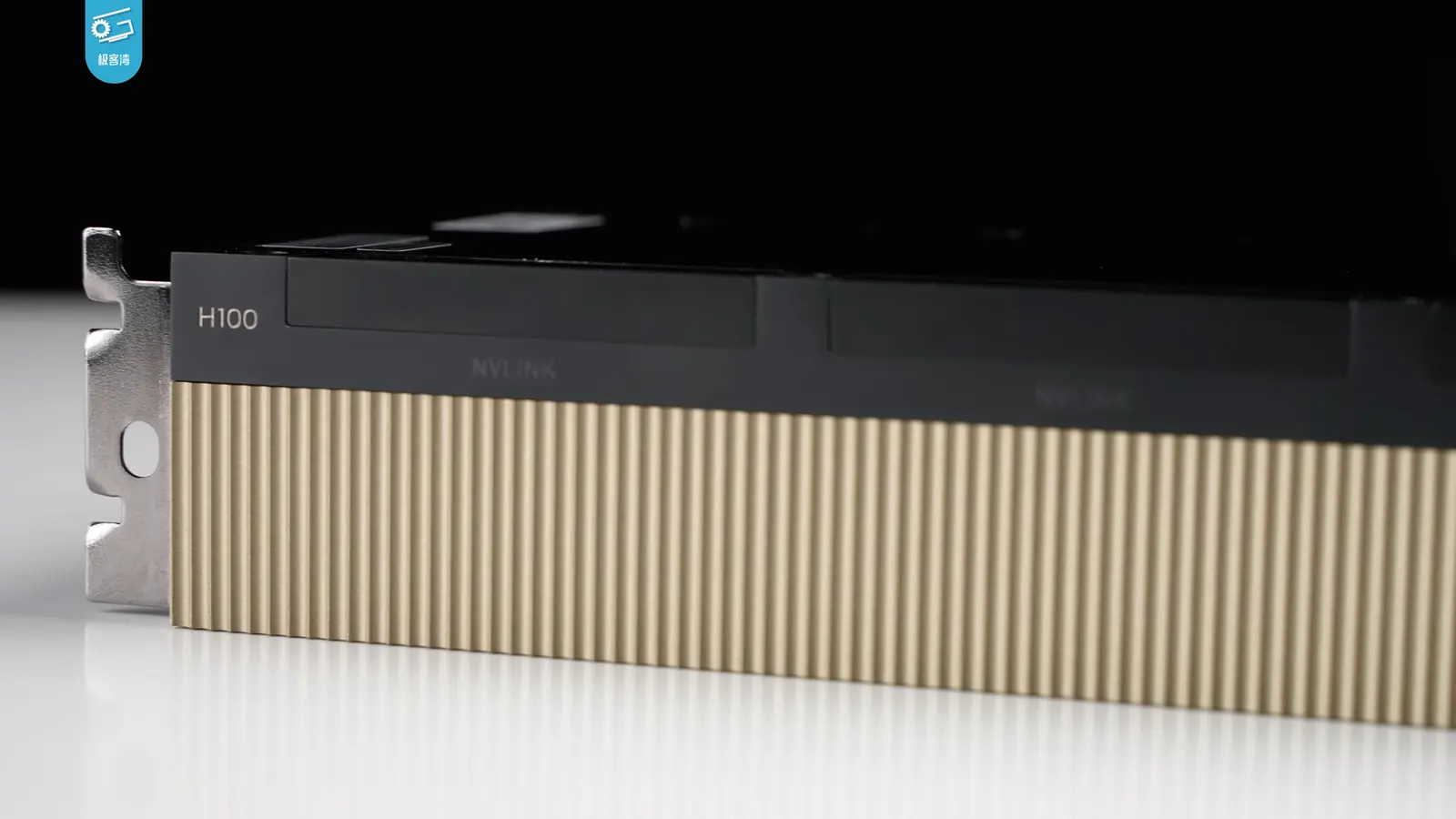 Close-up of an NVIDIA H100 accelerator and its gold-coloured heatsink