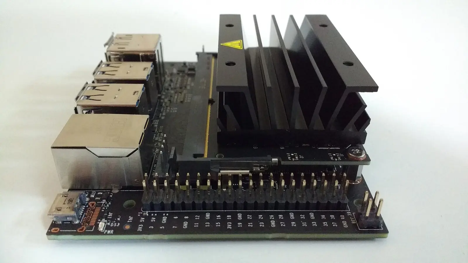 NVIDIA Jetson Nano development board with heatsink, USB ports and Ethernet connection
