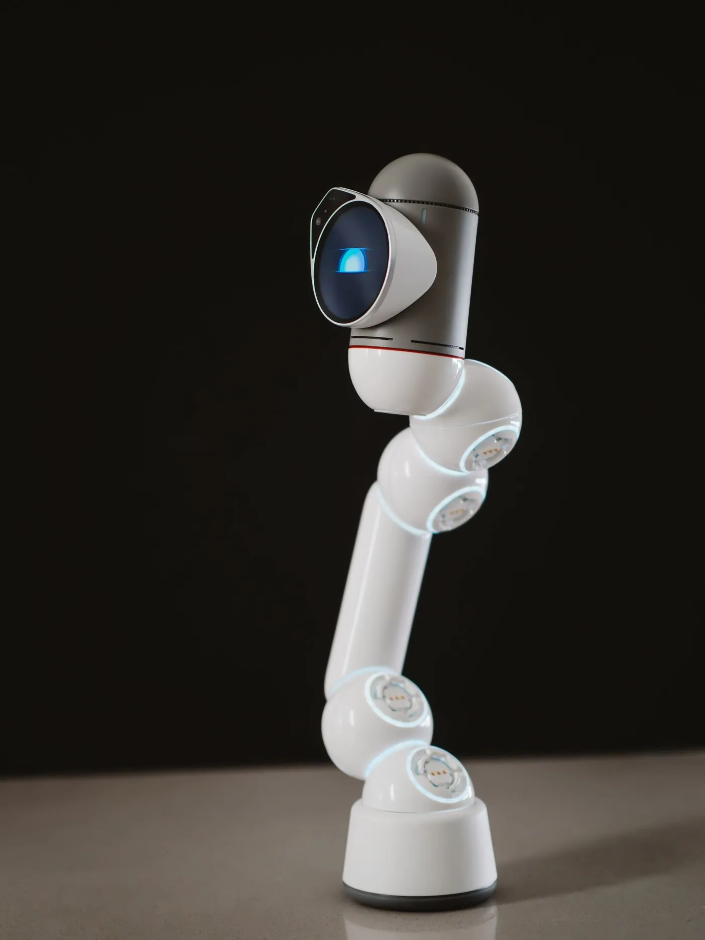 Small tabletop robot with a camera-like head